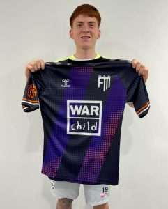 Football Manager’s most-signed wonderkid poses with special one-of-a-kind shirt – and he plays in the Premier League