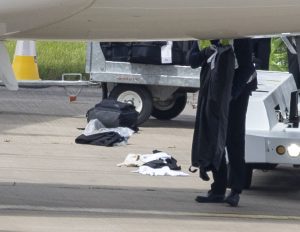 England stars’ clothes spill onto Birmingham Airport tarmac as sloppy baggage handlers drop bags before Euro 2024 flight