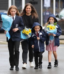 Rob Burrow’s tearful wife Lindsey and kids lay flowers at Headingley Stadium where fans left tributes for rugby hero