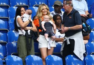 England Wags rally round beaming Annie Kilner as she arrives with son to cheer on Kyle Walker in crunch Euros clash