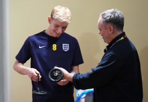 Anthony Gordon given cheeky gift by photographer after bike crash as England star reveals what caused high-speed crash