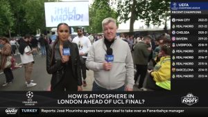 Geoff Shreeves blocks fan from putting arm around female CBS Sports presenter live on TV before Champions League final