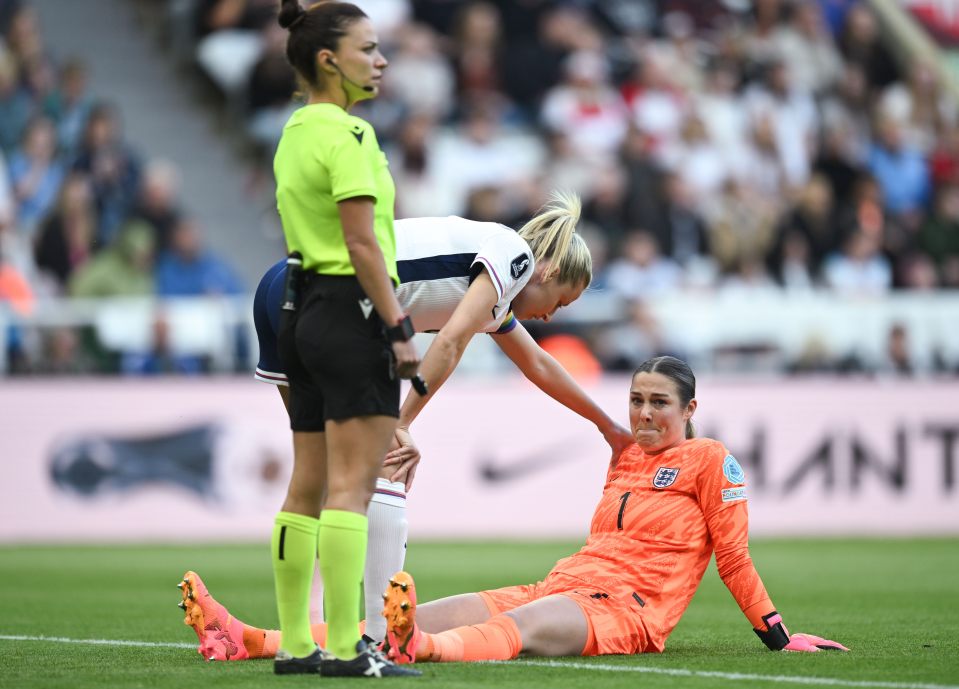 Mary Earps in tears after collapsing in pain just minutes into England loss to France before being spotted on crutches