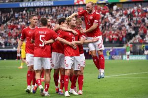 Denmark pip Slovenia to second place in Group C by little-known tiebreaker – but are rewarded with brutal last-16 draw