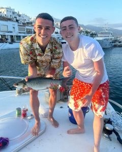 England ace Phil Foden poses with fish he caught with brother on pre-Euro holiday with family