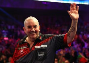 Darts legend Phil Taylor agrees to play Luke Littler in exhibition match – but only when he’s recovered from injury