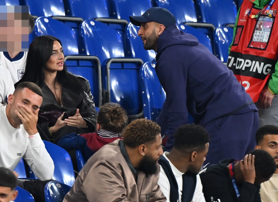 Kyle Walker and wife Annie Kilner celebrate in the stands with kids after England win on Father’s Day