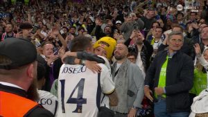 Heartwarming moment Joselu hugs crying son in crowd after former Premier League flop wins Champions League