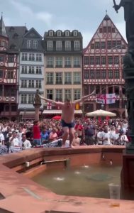 Watch England fan dive into Frankfurt fountain as Three Lions get in party spirit before Denmark clash at Euro 2024