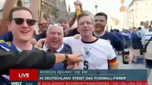 Watch shock moment kilt-wearing Scotland fan’s wardrobe malfunction live on TV leaves reporter very flustered