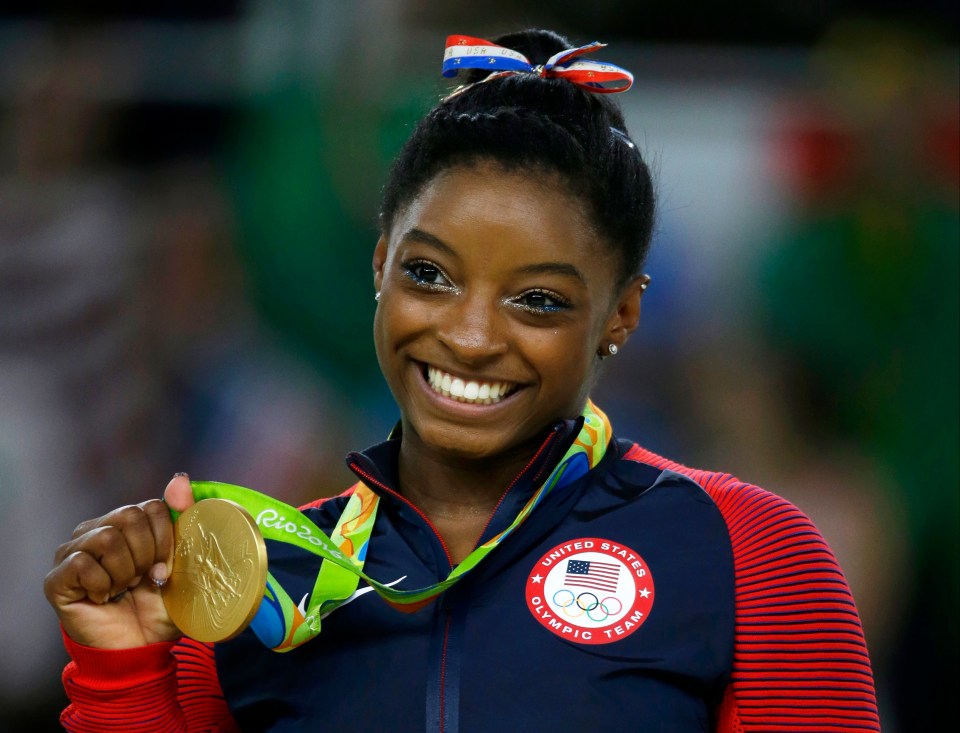 Who are Simone Biles’ coaches Cecile Canqueteau-Landi and Laurent Landi?