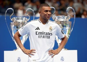 Watch Kylian Mbappe speak Chinese in advert as fans claim he is morphing into Cristiano Ronaldo