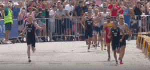 Incredible moment Team GB star sacrifices his race to help team-mate Alex Yee win gold in Paris Olympics triathlon