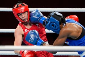 Why do women wear headguards but not men in Olympic boxing?