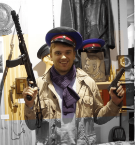 Russian reality TV star ‘spy’ arrested over threat to Paris Olympics opening ceremony is REVEALED with gun-toting pic
