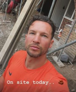Former England star, 34, hits back at troll after posting picture of himself ‘grafting’ on building site