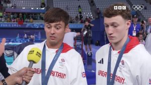 Adorable moment Tom Daley’s live BBC Olympics interview is interrupted by his 15-month-old son throwing his juice cup