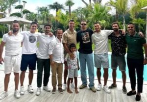 Cristiano Ronaldo links up with former Man Utd team-mate on holiday as they are treated to performance by singer