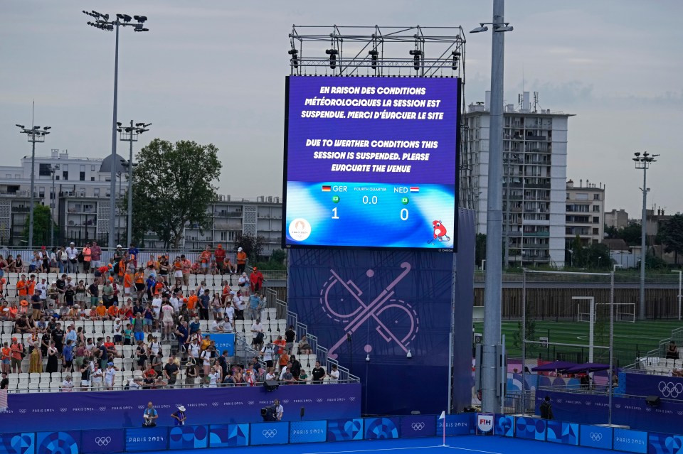 Olympic stadium evacuated over weather warning and play SUSPENDED – before stars forced to play without fans