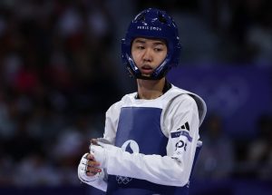 Fans say ‘that should be illegal’ as Taekwondo champ kicks injured opponent to the floor in Olympics 2024 ‘disgrace’