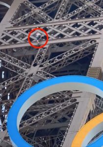 Eiffel Tower evacuated hours before Olympics closing ceremony in Paris as shirtless man seen climbing 1,000ft landmark