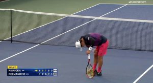 US Open star collapses to ground mid-game and leaves match in wheelchair in worrying scenes