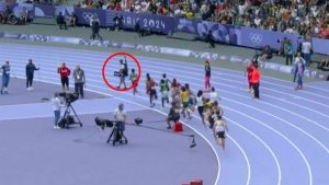 Moment Olympics 2024 star gives dozy cameraman death stare after he bizarrely ambles into middle of track during race