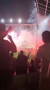 Conference League clash suspended as police evacuate entire away stand after shameful scenes