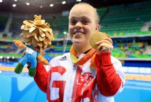 Who is former Paralympian swimmer Ellie Simmonds and when did she receive her OBE?