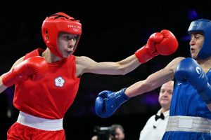 Gender row boxer Lin Yu-Ting controversially floored TWICE by rival who is booed – but WINS to guarantee Olympic medal