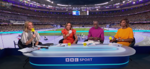 Awkward moment BBC pundit caught eating and on phone on live TV at Olympics as fans call him ‘international treasure’