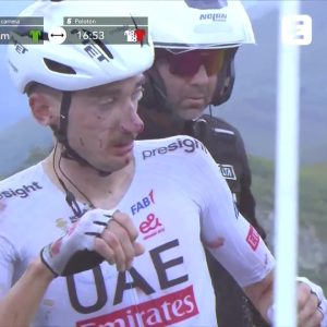 Shocking moment cyclist left covered in blood after falling over barrier and into RAVINE at Vuelta de Espana