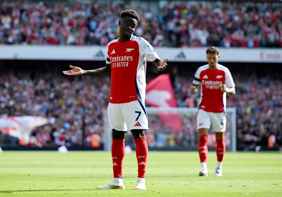 Arsenal 2 Wolves 0: Gunners get Premier League campaign off to flyer with simple win as they aim to end title drought