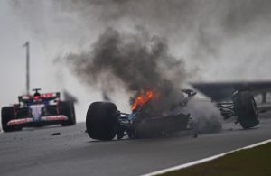 F1 car goes up in FLAMES after huge 110mph crash in Dutch GP practice as camera crew forced to rush out the way