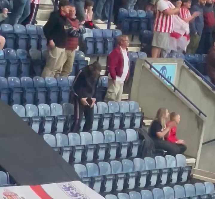 Stunned supporters reckon football fan ‘thinks he’s at the cricket’ after bizarre antics in crowd spotted