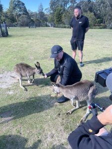 Luke Littler feeds kangaroos as darts ace, 17, touches down in Australia and fans say ‘the Goat visiting an animal park’