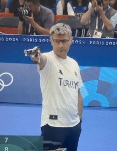 Olympics star, 51, goes viral for unusual outfit ‘like he was taking a walk around the park’ but wins silver medal