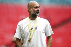 What is on Pep Guardiola’s T-shirt?