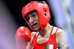 Gender row boxer Imane Khelif WINS Olympics quarter-final showdown and is now guaranteed a medal