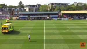 Shocking footage shows ambulance forced to drive onto PITCH after footballer suffers horror injury