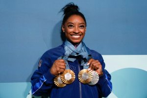 Simone Biles shows off custom 0,000 Mercedes G-Wagon gift after winning historic three golds at Paris Olympics