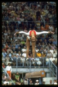 What is the dead loop in gymnastics and why is the Korbut flip manoeuvre banned in the Olympics?