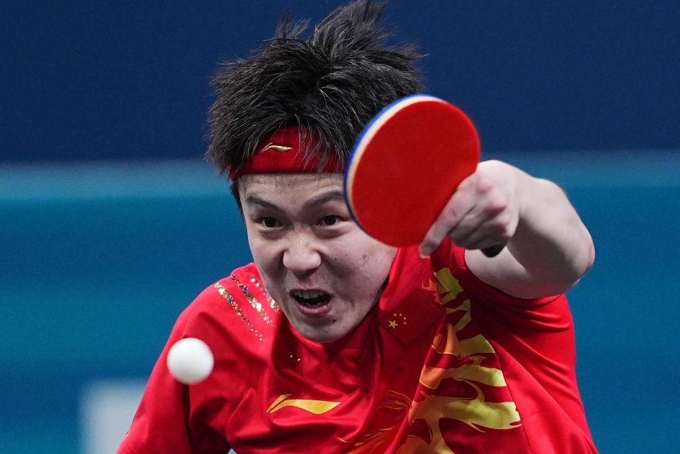 World No1 has table tennis paddle SNAPPED by photographer after winning doubles gold… before shock last- 32 singles loss