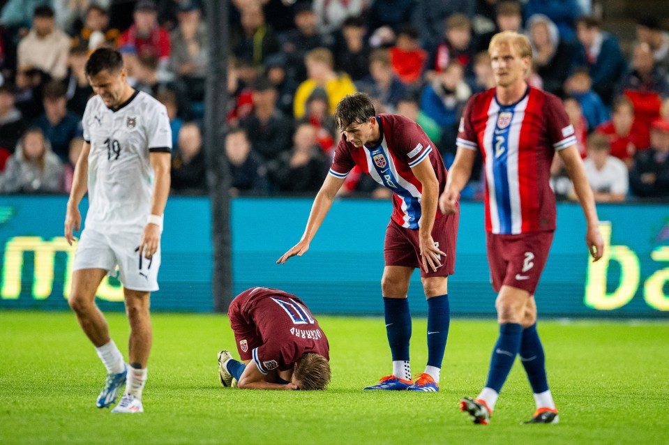 Arsenal star Martin Odegaard spotted on crutches boarding private jet in worrying injury blow ahead of Tottenham clash