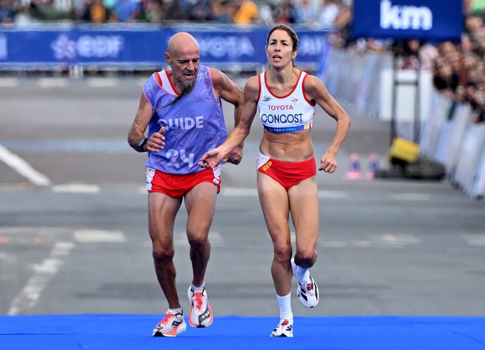 Heartbreaking moment Paralympic marathon runner misses out on medal after being disqualified TWO METRES from line