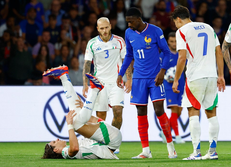 Arsenal in injury scare as new signing Calafiori hobbles off for Italy after freak collision with France ace Dembele