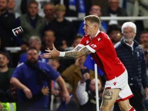 Watch moment Wrexham wind-up James McClean catches cup of BOVRIL thrown by Birmingham fans and pretends to neck it