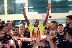 Chaos as Victor Osimhen is greeted by flare-wielding Galatasaray fans as he leads them in chant at 4am after transfer