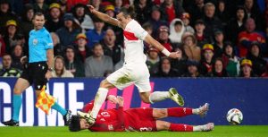 Wales star compared to WWE legend Ric Flair after he was kicked in the HEAD during Turkey Nations League clash