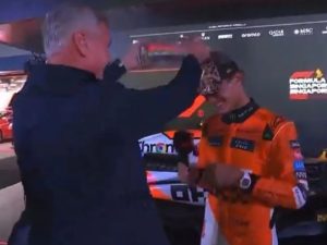 Emotional Lando Norris hugs F1 legend after Sky Sports presenter soaks McLaren star with water to ‘help out’